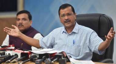 NEW DELHI INDIA APRIL 14 2023 Arvind Kejriwal Chief Minister of Delhi with AAP MP Sanjay Singh addressing a press conference ahead of receiving summons from CBI at Civil Lines on April 14 2023 in New Delhi India The Delhi CM was speaking at a press c clipart