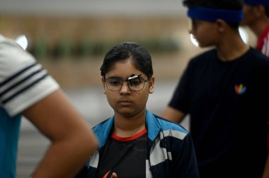 NOIDA INDIA APRIL 15 2023 Participants seen at the Shooting competition at Noida stadium sector 21A Noida authority organizes shooting competitions for men and women on the occasion of 48th Noida foundation day on April 15 2023 in Noida India Photo b clipart