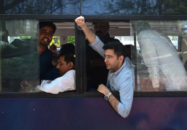 NEW DELHI INDIA APRIL 16 2023 AAP leaders Raghav Chaddda shouts slogans as he was detained by police personnel during a sitting protest dharna Near CBI Office at Golf Link Road in support of Delhi CM Arvind Kejriwal on April 16 2023 in New Delhi Indi clipart