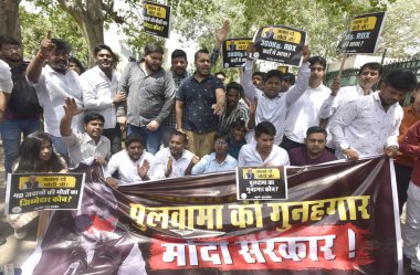 NEW DELHI INDIA APRIL 18 2023 The Indian Youth Congress activist protested against the Central Government over the disclosure made by former Jammu and Kashmir Governor Satya Pal Malik outside IYC office on April 18 2023 in New Delhi India Former Jamm clipart