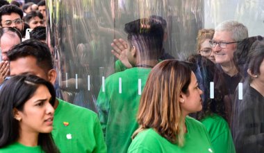 MUMBAI INDIA APRIL 18 2023 Tim Cook CEO Apple Inc greets the crowd during inauguration of Apple Store first outlet opened in India at Bandra Kurla Complex on April 18 2023 in Mumbai India Photo by Anshuman Poyrekar Hindustan Times clipart