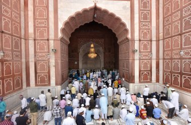 NEW DELHI INDIA APRIL 21 2023 Muslim devotees offer Alvida Namaz on the last Friday of the holy month of Ramadan at Jama Masjid on April 21 2023 in New Delhi India  clipart