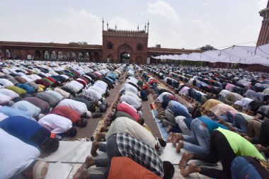 NEW DELHI INDIA APRIL 21 2023 Muslim devotees offer Alvida Namaz on the last Friday of the holy month of Ramadan at Jama Masjid on April 21 2023 in New Delhi India  clipart