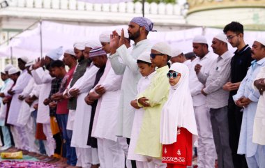 LUCKNOW INDIA APRIL 21 2023 People offering Alvida Namaj at Tile Wali Mosque of Bara Imambara on April 21 2023 in Lucknow India  clipart