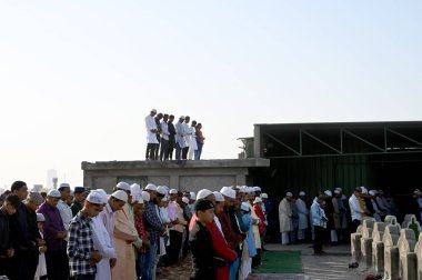 NOIDA INDIA APRIL 22 2023 Muslims offer prayers namaz on the occasion of Eid Ul Fitr at the Sector 8 Jama Masjid on April 22 2023 in Noida India Muslims around the world are getting into the festive Eid spirit as the holy month of Ramadan concludes T clipart