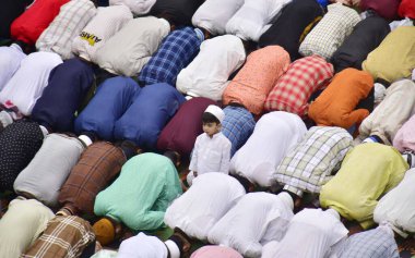 AMRITSAR INDIA APRIL 22 2023 Muslim Devotees offer prayers on the occasion of the Eid Ul Fitr at Khairuddin Mosque on April 22 2023 in Amritsar India Muslims around the world are getting into the festive Eid spirit as the holy month of Ramadan conclu clipart