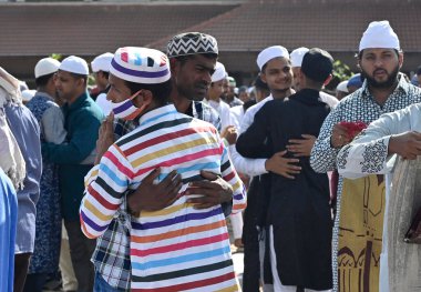 MUMBAI INDIA APRIL 22 2023 People offer namaz outside the station on the occasion of Eid al Fitr at Bandra on April 22 2023 in Mumbai India Muslims around the world are getting into the festive Eid spirit as the holy month of Ramadan concludes The fe clipart