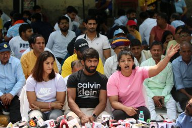 NEW DELHI INDIA APRIL 24 2023 Wrestlers Bajrang Punia Vinesh Phogat Sakshi Malik during a protest against WFI President Brij Bhushan Sharan Singh over different allegations at Jantar Mantaron April 24 2023 in New Delhi India Photo by Salman Ali Hindu clipart