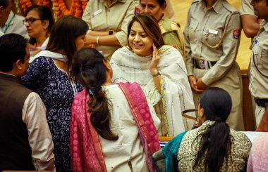 NEW DELHI INDIA APRIL 26 2023 Newly elected MCD Mayor Shelly Oberoi greets BJP candidate Shikha Rai R who withdrew her nomination for the mayor post during the election at Civic Centre in New Delhi on April 26 2023 in New Delhi India Photo by Raj K R clipart