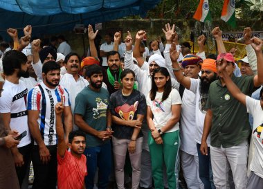 NEW DELHI INDIA APRIL 26 2023 Different Farmers Union and Khap Panchayat came to support Wrestlers Sangeeta Phogat along with Vinesh Phogat and Sakshi Malik during their ongoing protest against WFI president Brij Bhushan Sharan Singh at Jantar Mantar clipart