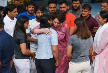 NEW DELHI INDIA: APRIL 29, 2023 - Congress leader Priyanka Gandhi with wrestlers Bajrang Punia Vinesh Phogat Sakshi Malik and Sangita Phogat during their protest at Jantar Mantar on April 29 2023 in New Delhi India Wrestlers resumed their protest. clipart