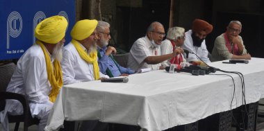 NEW DELHI, INDIA, APRIL 30 2023 - Samyukt Kisan Morcha members Darshan Pal Hannan Mollah Ashok Dhawale and others address a press conference at Press club on April 30 2023 in New Delhi India (Photo by Sonu Mehta Hindustan Times) clipart