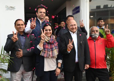 NEW DELHI INDIA DECEMBER 17 2024 DDCA President Rohan Jaitely and vice President Shikha Kumar Joint Secretary Amit Grover and Apex Council of the Delhi District Cricket Association DDCA members after winning DDCA election during the press conference  clipart