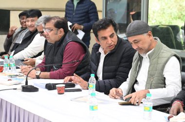 NEW DELHI INDIA DECEMBER 17 2024 Congress in charge of Delhi Qazi Nizamuddin DPCC president Devendra Yadav alongwith Congress candidates for upcmoing Delhi assembly Elections during the special meeting at Rajeev Bhawan on December 17 2024 in New Delh clipart