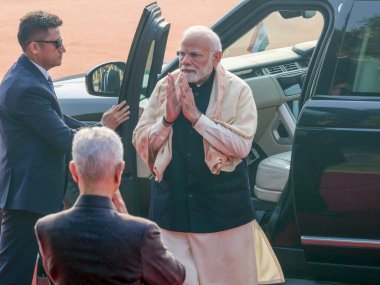 NEW DELHI INDIA DECEMBER 16 2024 Prime Minister Narendra Modi gestures as he arrives to attend the ceremonial reception of Sri Lankan President Anura Kumara Dissanayake at the presidential palace at Rashtrapati Bhavan on December 16 2024 in New Delhi clipart