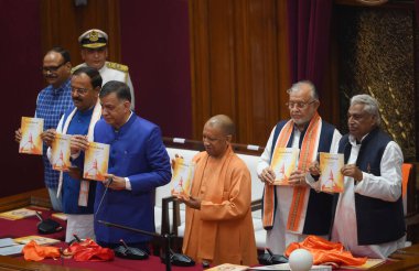 LUCKNOW INDIA DECEMBER 16 2024 Vidhan Sabha Speaker Satish Mahana released the book on the Leader of opposition in the presence of Uttar Pradesh Chief Minister Yogi Adityanath Deputy Chief Ministers Keshav Prasad Maurya and Brajesh Pathak Cabinet Min clipart