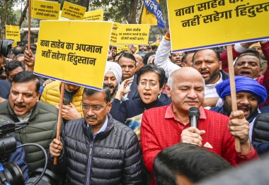 NEW DELHI INDIA DECEMBER 18 2024 Aam Aadmi Party National Convenor Arvind Kejriwal Delhi CM Atishi with AAP party leader Manish Sisodia Sanjay Singh Saurabh Bhardwaj during the protest against Home Minister Amit Shah over his statement concerning Bab clipart