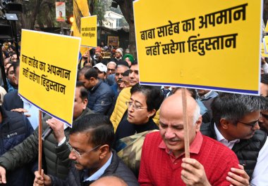 NEW DELHI INDIA DECEMBER 18 2024 Aam Aadmi Party National Convenor Arvind Kejriwal along with Delhi chief Minister Atishi party leaders Manish sisodia and Rajya Sabha MP Sanjay Singh and others protest against Home Minister Amit Shah over his stateme clipart