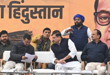 NEW DELHI INDIA DECEMBER 19 2024 Rajya Sabha MP Sanjay Singh talking with AAP National Convenor Arvind Kejriwal during a public meeting against the disrespectful statement made by Union Home Minister Amit Shah about Bharat Ratna Dr BR Ambedkar at Bha clipart