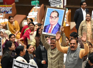 NEW DELHI INDIA DECEMBER 19 2024 AAP councillor protesting against the disrespectful statement made by Union Home Minister Amit Shah about Bharat Ratna Dr B R Ambedkar during the House meeting of Municipal Corporation of Delhi at Civic Centre Jawahar clipart