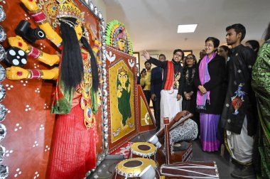 NEW DELHI INDIA DECEMBER 21 2024 Delhi Chief Minister Atishi interact with School students during the Lehar 2024 Art Exhibition organised at Shankar's Centre for Children CBT at Chanakyapuri on December 21 2024 in New Delhi India The exhibition was o clipart