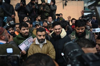 SRINAGAR INDIA DECEMBER 23 2024 National Conference MP Aga Ruhullah and Jammu and Kashmir People s Democratic Party PDP MLA Waheed Rehman Para during a protest outside the chief minister s residence to demand rationalisation of reservation policy as  clipart