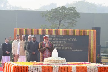 NEW DELHI, INDIA - DECEMBER 25, 2024: Prime Minister Narendra Modi pays tribute to former prime minister Atal Bihari Vajpayee on his birth anniversary, at Sadaiv Atal, on December 25, 2024 in New Delhi, India. clipart