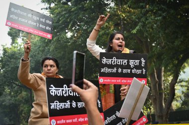 NEW DELHI INDIA DECEMBER 26 2024 Members of Delhi BJP Mahila Morcha stage a protest near former Delhi chief minister and AAP national convenor Arvind Kejriwal residence on December 26 2024 in New Delhi India Delhi BJP Mahila Morcha protest outside AA clipart