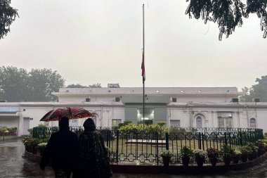 NEW DELHI INDIA DECEMBER 27 2024 Indian National Flag at half mast as nation mourns death of former Prime Minister Dr Manmohan Singh at AICC Congress HQ on December 27 2024 in New Delhi India Former Indian prime minister Manmohan Singh has died at th clipart