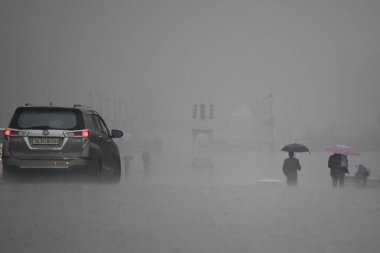 NEW DELHI INDIA DECEMBER 27 2024 A view of foggy weather during rainfall on a cold morning at Vijay Chowk Central Secretariat on December 27 2024 in New Delhi India Delhi and nearby areas received moderate to heavy rain on Friday leading to a drop in clipart