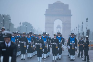 NEW DELHI INDIA DECEMBER 29 2024 Indian Navy and Coast Guard Contingent rehearsing for upcoming Republic day Parade during a cold weather at Kartavya Path on December 29 2024 in New Delhi India North India is reeling under cold weather with temperatu clipart