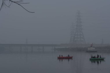 NEW DELHI INDIA DECEMBER 30 2024 A view of Yamuna river during the a cold winter foggy morning on December 30 2024 in New Delhi India North India is reeling under cold weather with temperatures plummeting across several states As per IMD the minimum  clipart