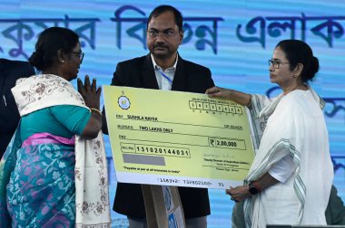 SANDESHKHALI INDIA DECEMBER 30 2024 Chief Minister Mamata Banerjee distributes various governments schemes to the people of Sandeshkhali during an Adminstrative Meeting in North 24 Parganas on December 30 2024 in Sandeshkhali India Almost a year afte clipart