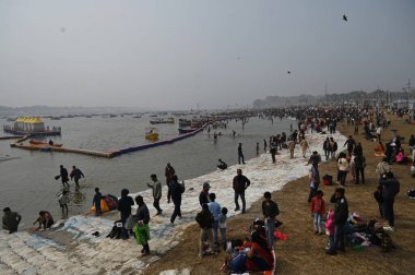 PRAYAGRAJ INDIA DECEMBER 30 2024 Many Hindu devotees begin arriving at Sangam at the start of the new year to take a holy dip and avoid the heavy rush during Mahakumbh Around 40 crore devotees are expected to participate in Mahakumbh 2025 on December clipart