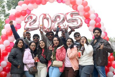 CHANDIGARH INDIA DECEMBER 31 2024 Visitors celebrating new year eve at Sukhna lake on December 31 2024 in Chandigarh India  clipart