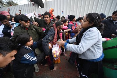 NEW DELHI, INDIA: JANUARY 1, 2025 - Stampede like situations occurred in the queue of devotees waiting to pay obeisance at the Kalka Mata Mandir on the first day of 2025 at Kalkaji. Photo by Salman Ali Hindustan Times clipart