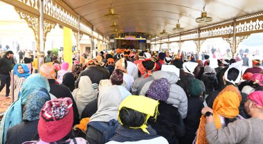 NEW DELHI, INDIA - JANUARY 1, 2025: Devotees visit Bangla Sahib gurudwara to offer prayers on the first day of New Year 2025, on January 1, 2024 in New Delhi, India. (Photo by Sonu Mehta/Hindustan Times) clipart