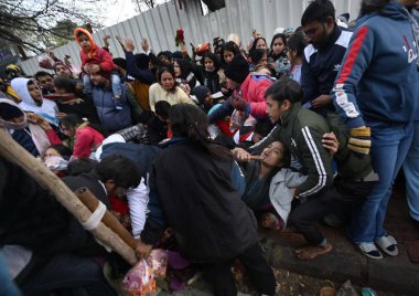 NEW DELHI, INDIA - JANUARY 1, 2025: Stampede-like situations occurred in the queue of devotees waiting to pay obeisance at the Kalka Mata Mandir on the first day of 2025, at Kalkaji. clipart