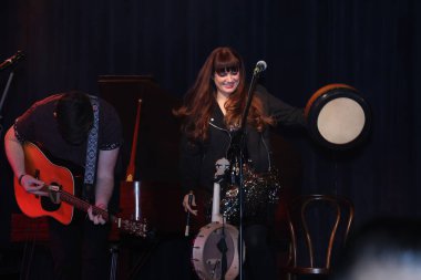 NEW DELHI, INDIA: DECEMBER 13, 2024 - Irish Singer Aoife Scott and her band members Andy Meaney and Cathal Currin perform during the Christmas dinner reception at Embassy of Ireland. Photo by Manoj Verma Hindustan Times clipart