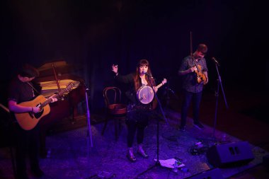 NEW DELHI, INDIA: DECEMBER 13, 2024 - Irish Singer Aoife Scott and her band members Andy Meaney and Cathal Currin perform during the Christmas dinner reception at Embassy of Ireland. Photo by Manoj Verma Hindustan Times clipart