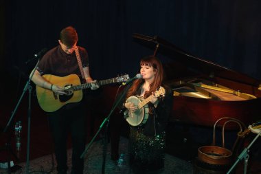 NEW DELHI, INDIA: DECEMBER 13, 2024 - Irish Singer Aoife Scott and her band members Andy Meaney and Cathal Currin perform during the Christmas dinner reception at Embassy of Ireland. Photo by Manoj Verma Hindustan Times clipart