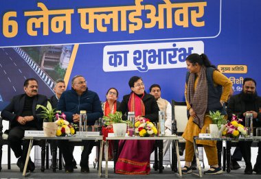 NEW DELHI, INDIA; JANUARY 2, 2025 - Atishi Chief Minister of Delhi along with AAP leaders Rakhi Birla and Shiv Charan Goel during the inauguration of newly constructed Punjabi Bagh Club Flyover at Ring Road on January 2 2025 in New Delhi India.  clipart