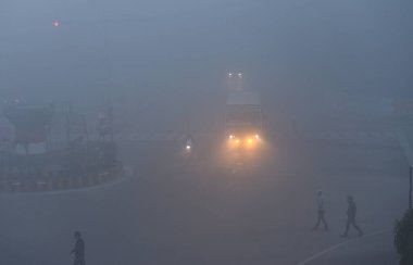 GHAZIABAD INDIA JANUARY 4 2025 A thick layer of fog seen engulfed in the early hours of a cold morning at hapur crossing on January 4 2025 in Ghaziabad India A dense blanket of fog once again engulfed national capital Delhi on Saturday morning reduci clipart