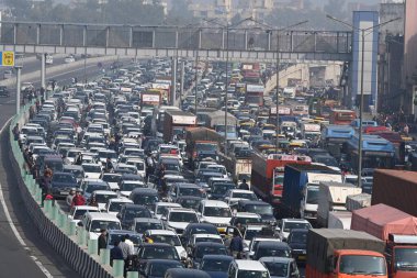 NEW DELHI INDIA JANUARY 5 2025 Traffic being stopped on NH24 near Akshardham as Prime Minister Narendra Modi arrived in East Delhi to inaugurate the Namo Bharat Rapid Train a 13 km stretch of the Delhi Meerut Regional Rapid Transit System RRTS corrid clipart