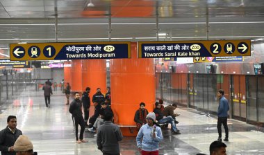 NEW DELHI INDIA JANUARY 5 2025 People arrive to takes a ride at Anand Vihar station after inauguration of a 13 km section of the Delhi Meerut Regional Rapid Transit System RRTS corridor Namo Bharat train on Sunday connecting Sahibabad in Uttar Prades clipart