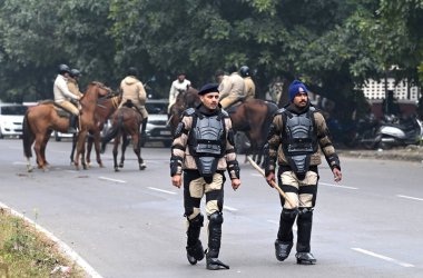 CHANDIGARH ,INDIA ,JANUARY 7, 2025 Chandigarh Police personnels on Horses during the Qaumi Insaaf Morcha demonstration at the chandigarh mohali border near YPS Chowk on January 7 2025 in Chandigarh India Since February 2023  clipart