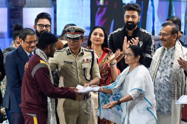 KOLKATA INDIA JANUARY 8 2025 Santosh Trophy winner Bengal Football players received job certificate from West Bengal Chief Minister Mamata Banerjee during Students Week 2025 event on January 8 2025 in Kolkata India Photo by Samir Jana Hindustan Times clipart