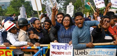 KOLKATA INDIA JANUARY 13 2025 Police barricade as Congress activists take out a protest rally from Karunamoyee to Swasthya Bhavan against death of a woman after administered expired saline water produced by Paschim Banga Pharmaceuticals Ltd and deman clipart