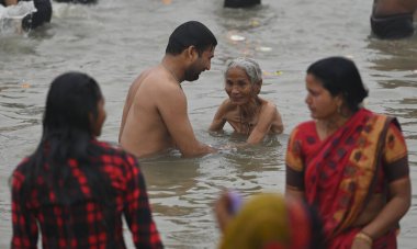 PRAYAGRAJ INDIA JANUARY 13 2025 Devotees take a holy dip at Sangam the confluence of the Ganges Yamuna and Saraswati rivers during the Maha Kumbh Mela on January 13 2025 in Prayagraj India The 45 day Mahakumbh Mela 2025 celebrated as the largest gath clipart