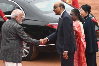 NEW DELHI INDIA JANUARY 16 2025 President Droupadi Murmu and Prime Minister Narendra Modi exchange greetings with Singapore President Tharman Shanmugaratnam and First Lady Jane Yumiko Ittogi during a ceremonial reception at the Rashtrapati Bhavan on  clipart